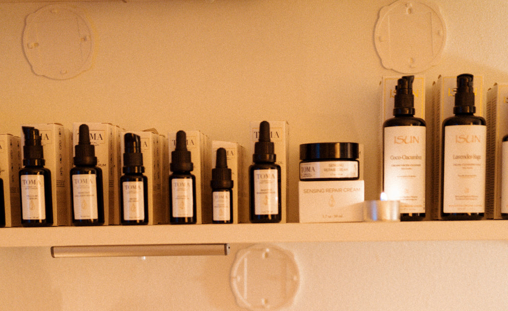 ISUN Skincare products on a white shelf at Green Revolution Studio in Bethesda, Maryland